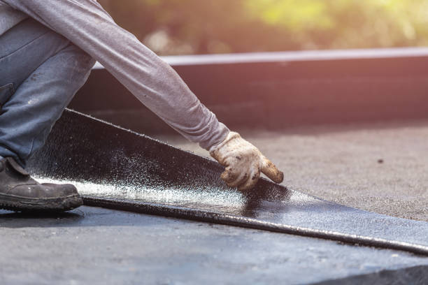 Professional Basement Waterproofing technician working in Dayton, MN